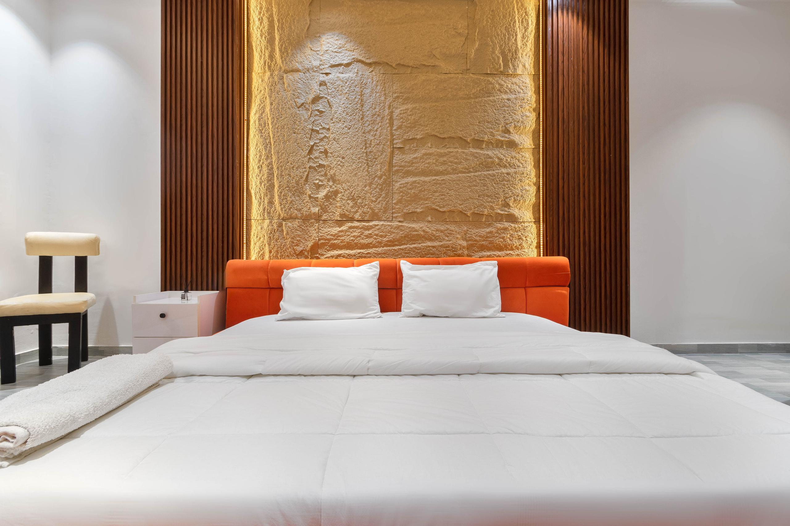 Sandstone Feature Wall with Dark Wood Slats