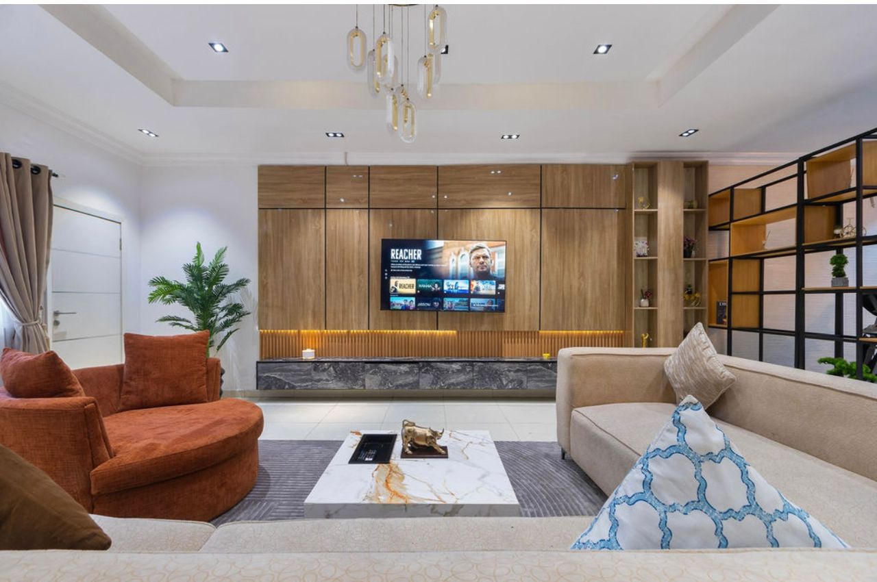 Living Room with Burnt Sienna Swivel Chair